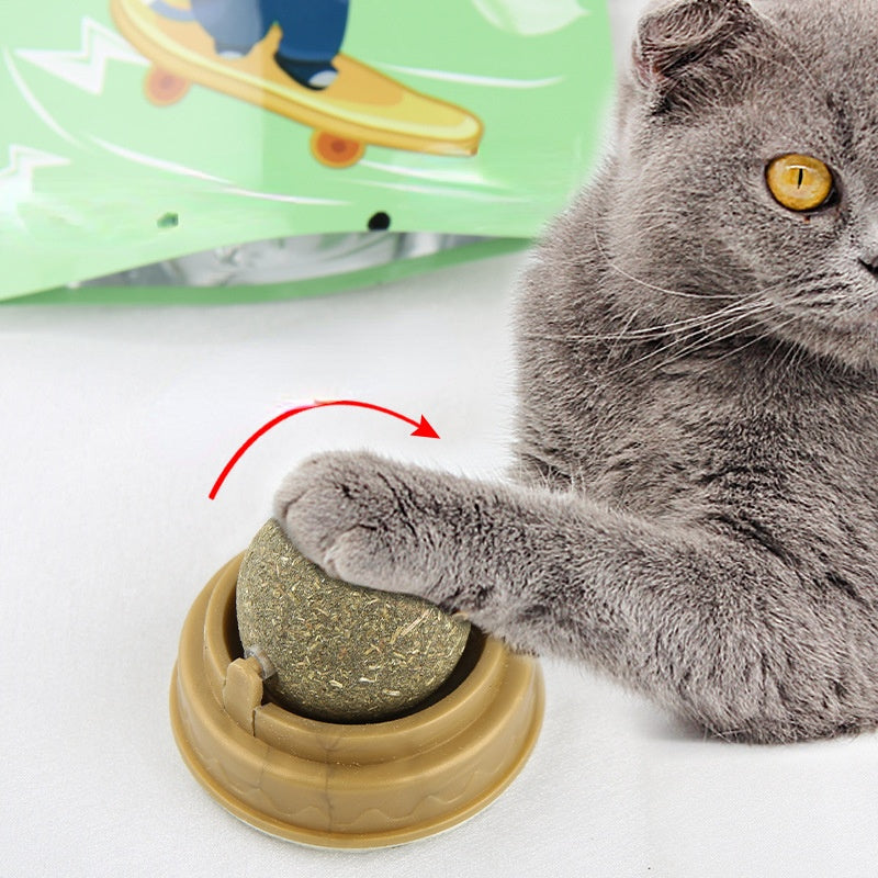 "catnip ball treat for dental cleaning" "rotary molar cat toy smart pet gadget" "cat teeth cleaning catnip ball" "natural catnip licking toy for cats" "cat dental care treat plaque tartar removal" "sticky wall catnip toy rotating molar ball" "cat chew toy for teeth cleaning and fresh breath"