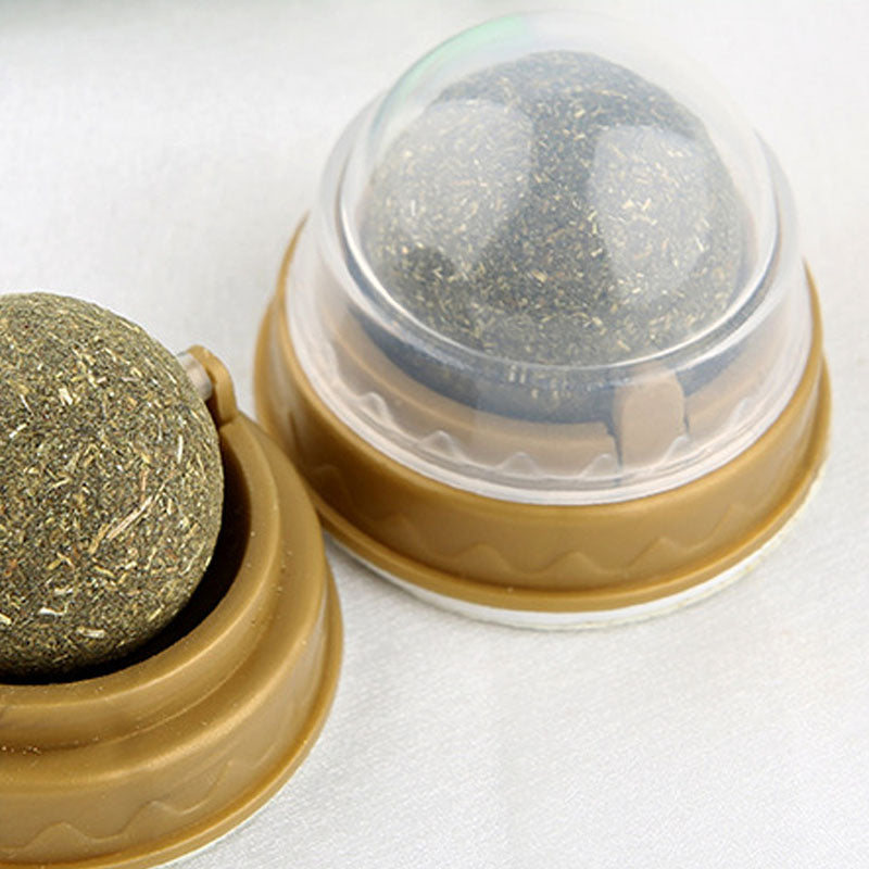 "catnip ball treat for dental cleaning" "rotary molar cat toy smart pet gadget" "cat teeth cleaning catnip ball" "natural catnip licking toy for cats" "cat dental care treat plaque tartar removal" "sticky wall catnip toy rotating molar ball" "cat chew toy for teeth cleaning and fresh breath"